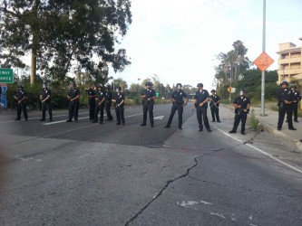 Police barricade against protesters.  Photo by Jazmin Garcia for Intersections South LA.