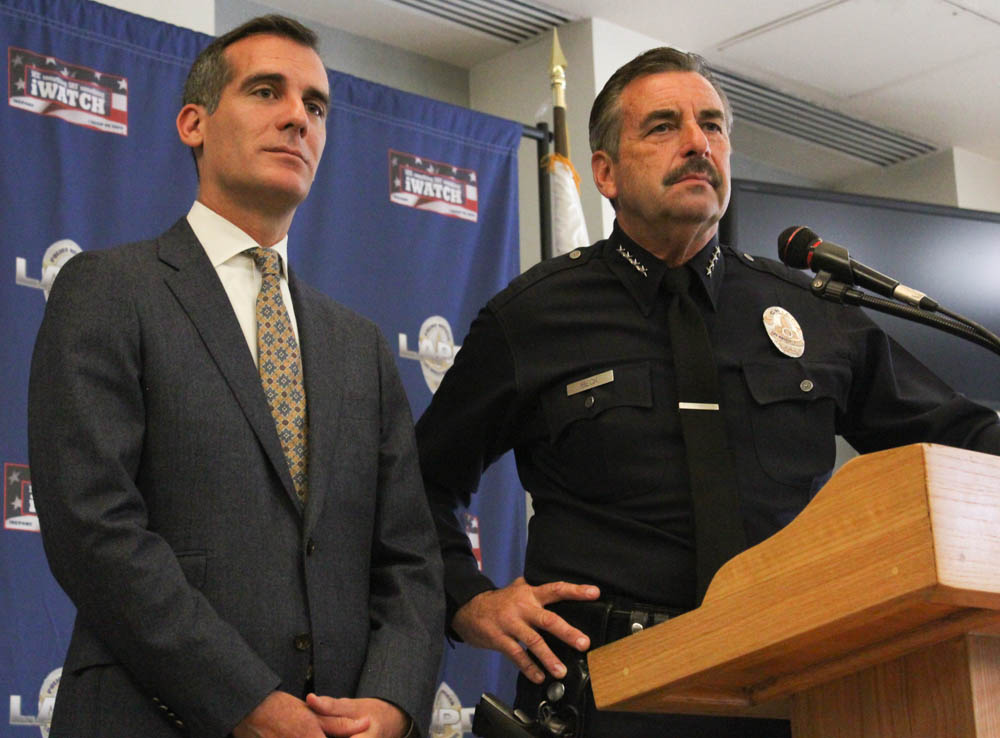 Mayor Eric Garcetti and LAPD Chief Charlie Beck speak about crime statistics at a recent conference held at the 77th Division station in South L.A. | Daina Beth Solomon