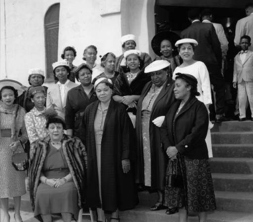 "Church Mothers" stand outside the First AME Church in South LA, circa 1960. | USC Digital Library