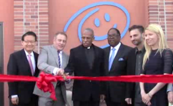 Cutting the ribbon at opening of St. John's Well Child and Family Center. | Jessica Harrington (Annenberg TV News)