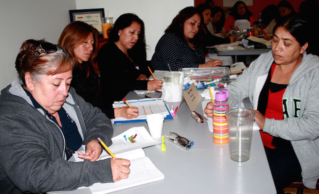 South LA residents receive training from Esperanza Community Housing to be health promoters.