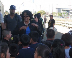 Jan Perry greets kids at Wetlands Park