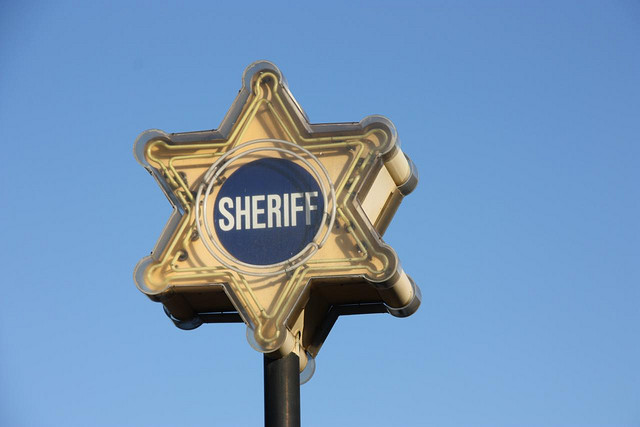 A neon sign for the LA County Sheriff's Department |  Michael Dorausch
