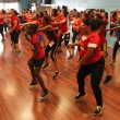 Students get some air time while jumping in a Zumba class. | Daina Beth Solomon