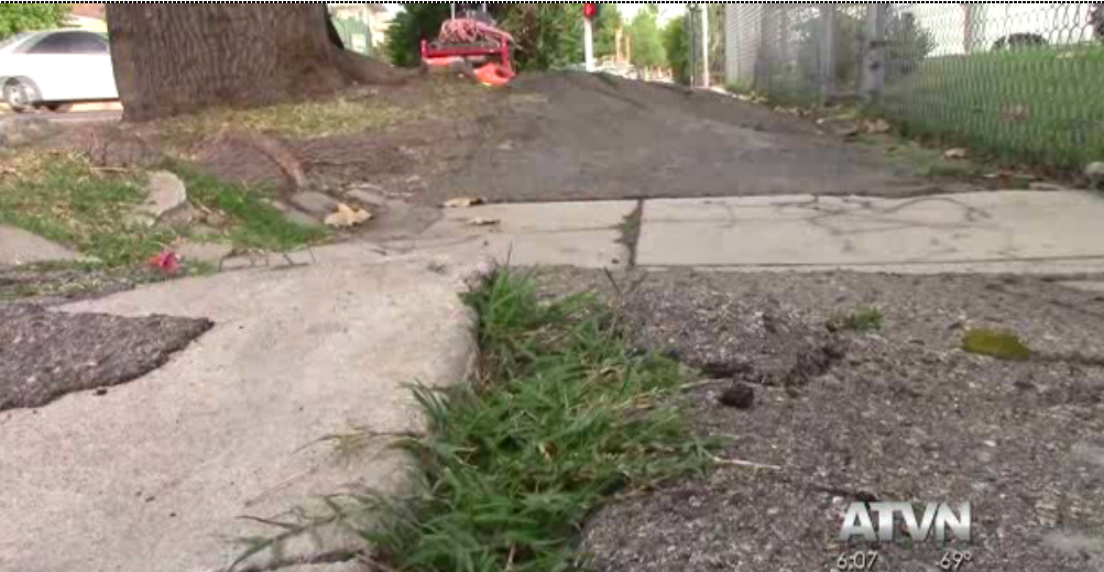 A cracked, broken sidewalk yet to be repaired in District 8. | ATVN
