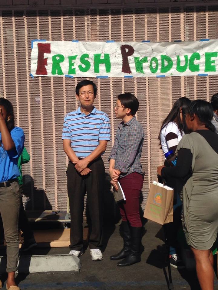 Store owner Jong Soo Park prepares to give a speech to the crowd attending the grand opening. | Jordyn Holman