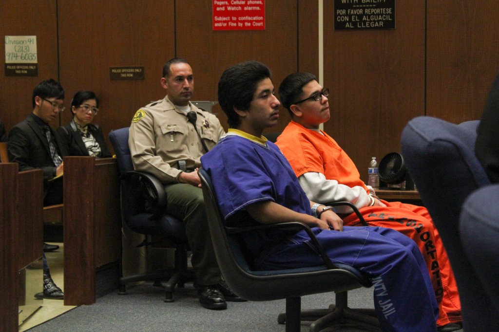 Jonathan DelCarmen and Alberto Ochoa listen to witnesses give testimony as Rose Tsai, attorney for Xinran Ji's parents, watches from the audience. | Daina Beth Solomon